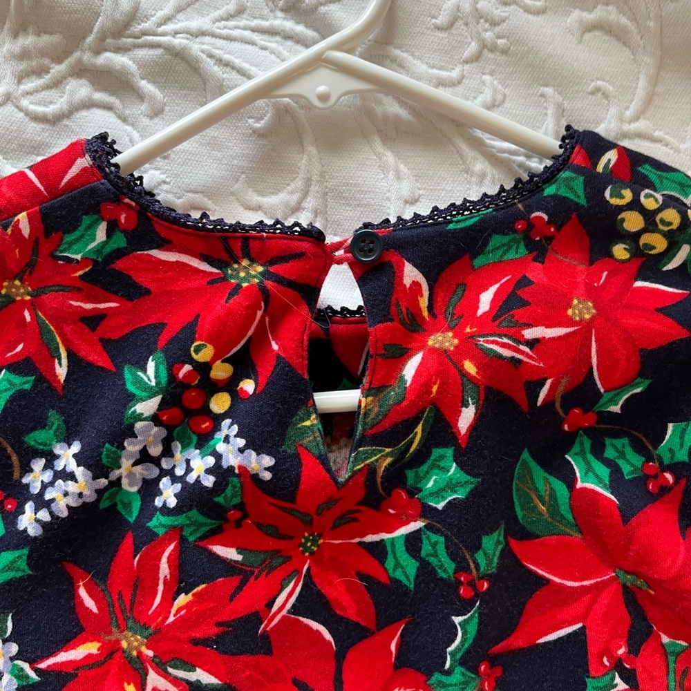 Festive Floral Top with Red and Green Poinsettias